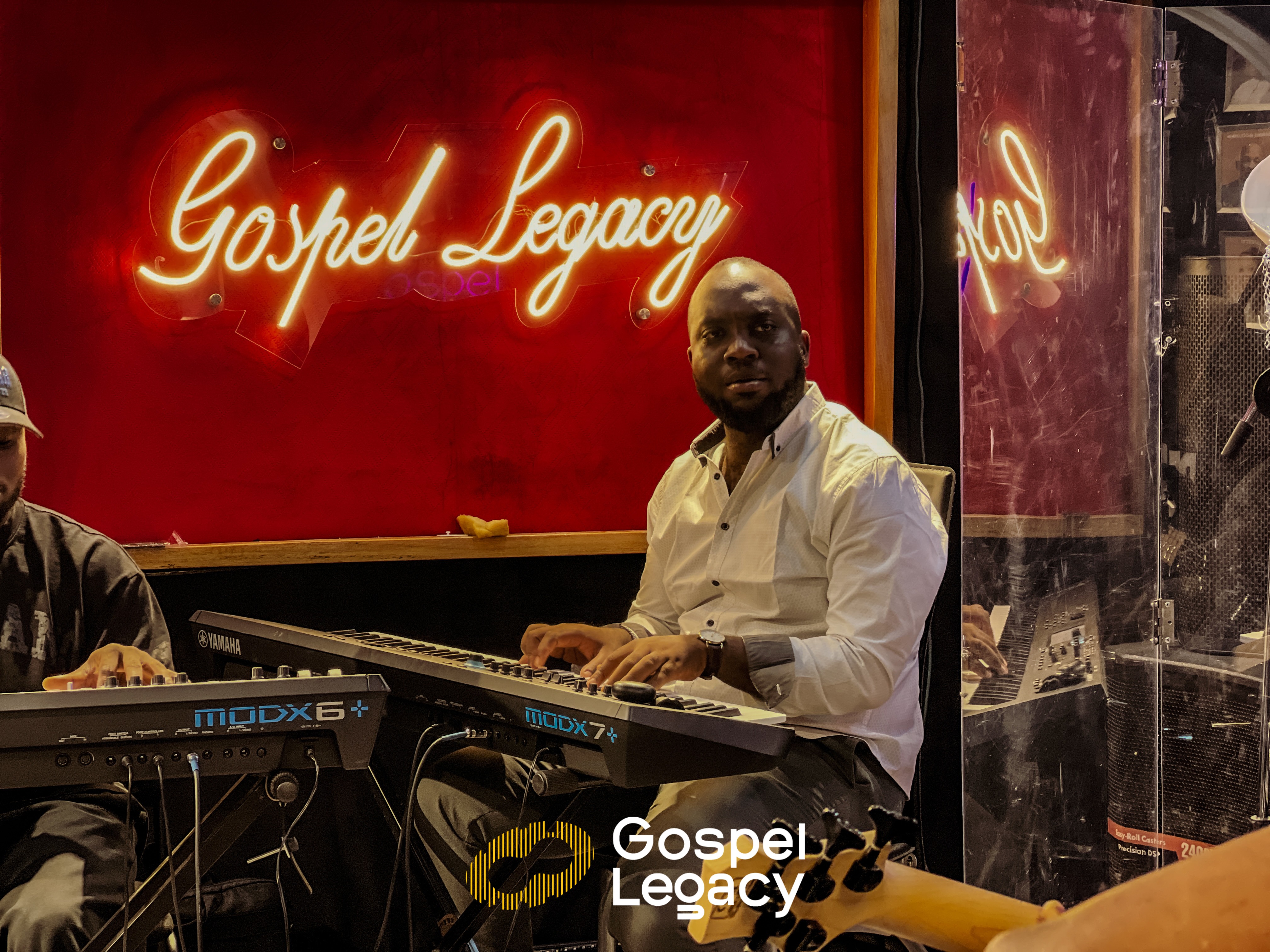 Anatole Djoko playing the keyboard at Gospel Legacy Studio